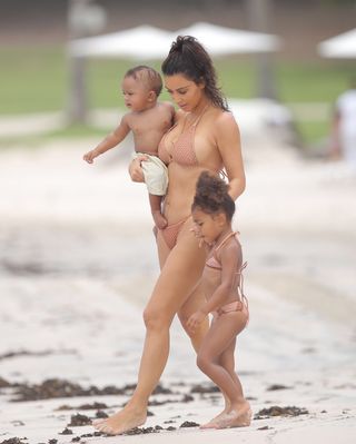 adorable-kim-kardashian-and-north-west-wore-matching-tan-bikinis-1875734-1471623166