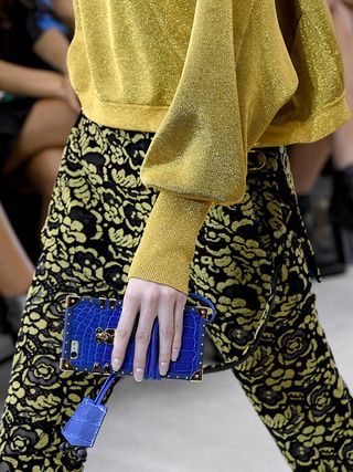 louis-vuitton-models-carried-iphone-cases-down-the-runway-1927237-1475682257