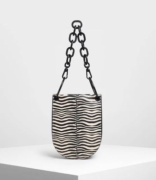 Charles & Keith + Zebra Print Chunky Chain Handle U-Shaped Bag