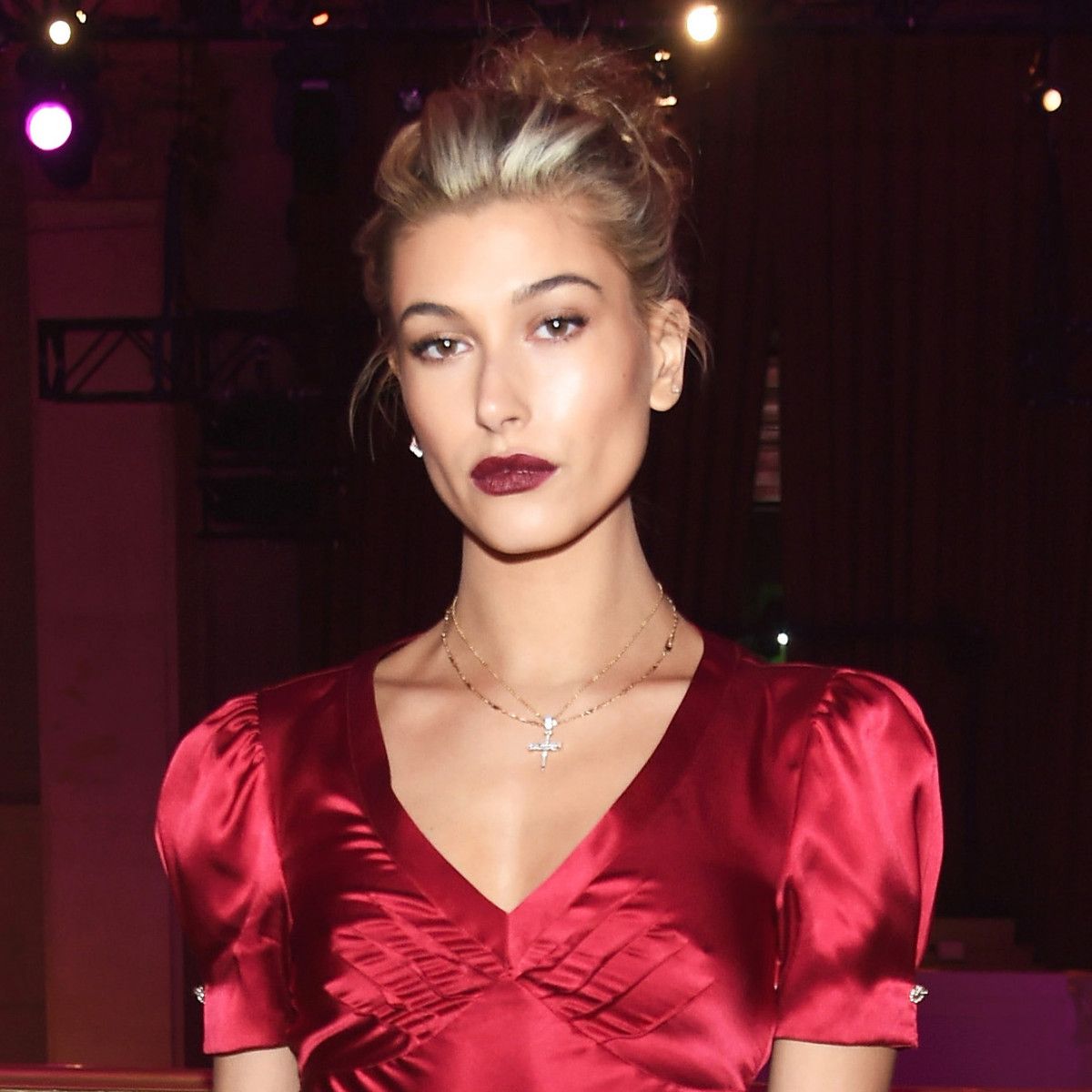 hailey baldwin red satin dress Hailey Baldwin donning a red satin skirt