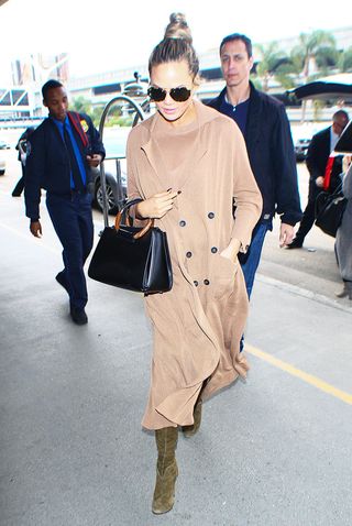 the-one-item-chrissy-teigen-almost-never-flies-without-1982159-1479424234