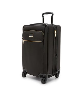 Tumi + International Carry On 4 Wheel Suitcase