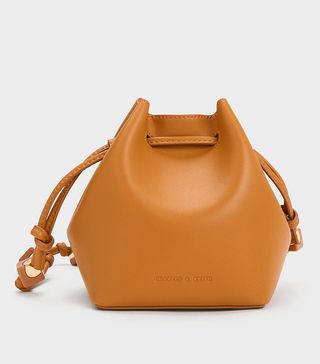 Charles & Keith + Orange Cube Knotted Bucket Bag