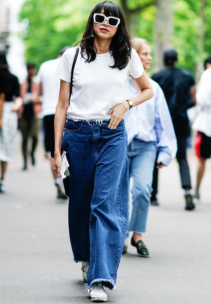 Relaxed T-shirt worn with high-rise wide-leg jeans