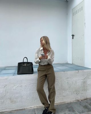 woman in poplin shirt and pants