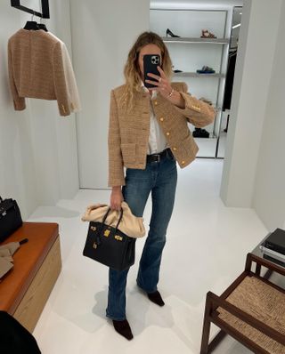 woman in tweed jacket and jeans