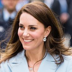 kate-middleton-just-debuted-her-baby-bump-in-a-pretty-lace-dress-238510-square