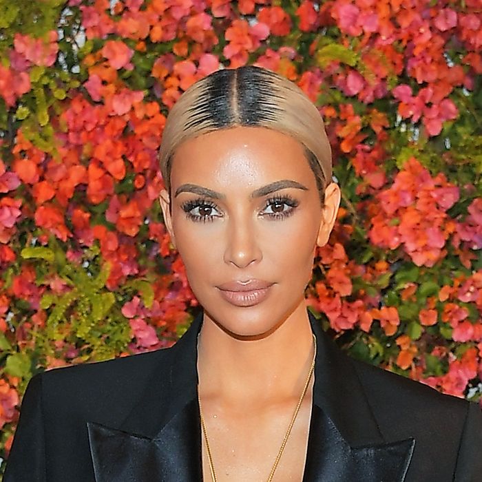 Kim Kardashian West Tops Off a Transparent Bra with a Blazer
