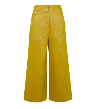Tibi + Garment Dyed Twill Cropped Wide-Leg Jeans in Mustard