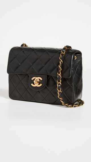 Chanel + Black Lambskin Half Flap Mini Bag