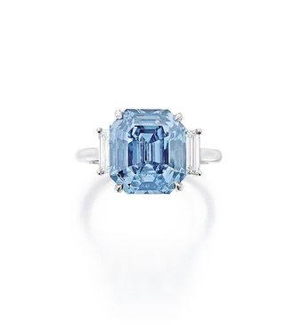Sotheby's + Exquisite Fancy Vivid Blue Diamond and Diamond Ring