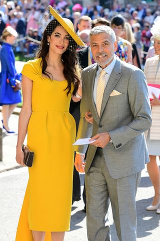 amal-clooney-wore-a-stunning-yellow-dress-to-the-royal-wedding-2772043