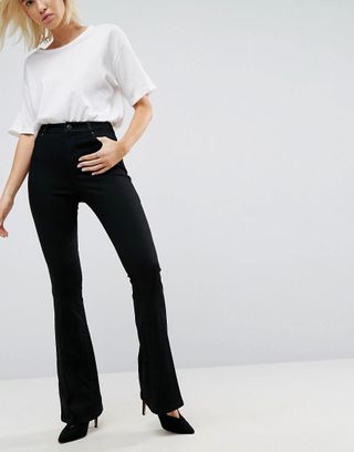 ASOS Design + Bell Flare Jeans in Clean Black with Pressed Crease