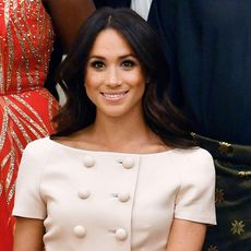 meghan-markle-just-wore-princess-dianas-signature-outfit-to-buckingham-palace-261561-square