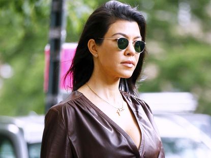 Kourtney Kardashian Wore a Naked-Strap Bikini | Who What Wear