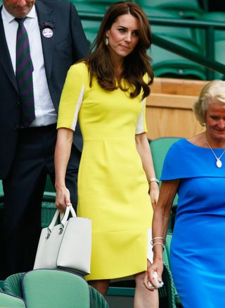 meghan-markle-and-kate-middleton-wore-very-different-wimbledon-outfits-in-2016-2862926