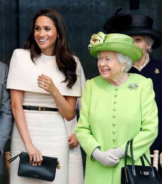 these-11-outfits-confirm-meghan-markle-already-has-the-best-handbag-collection-2877901