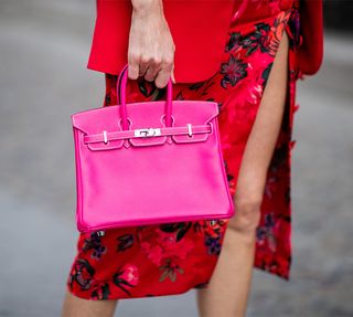 Hermès Birkin Bag Prices: How Much and Are They Worth It: a pink Birkin bag with an all red look