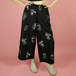 Dog Breath Apparel + Line Drawing Faces Print Black Wide-Leg Crop Trousers