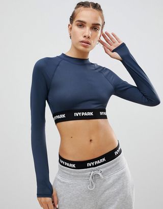 Ivy Park + Active Long Sleeve Crop Top in Blue
