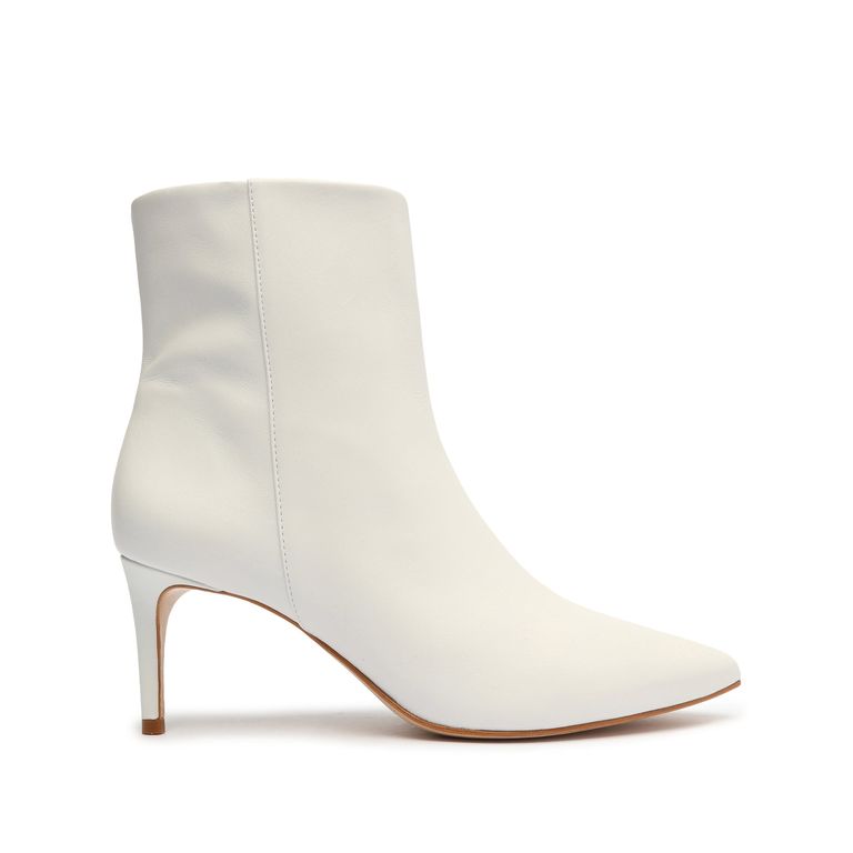 11 Stylish White-Boot Outfits to Wear Year-Round | Who What Wear