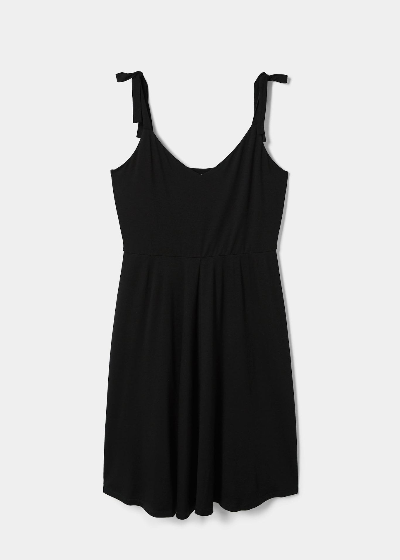 These New Year's Black Dresses Will Never Go Out of Style | Who What Wear