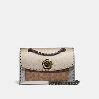 Coach + Parker in Signature Canvas With Rivets and Snakeskin Detail