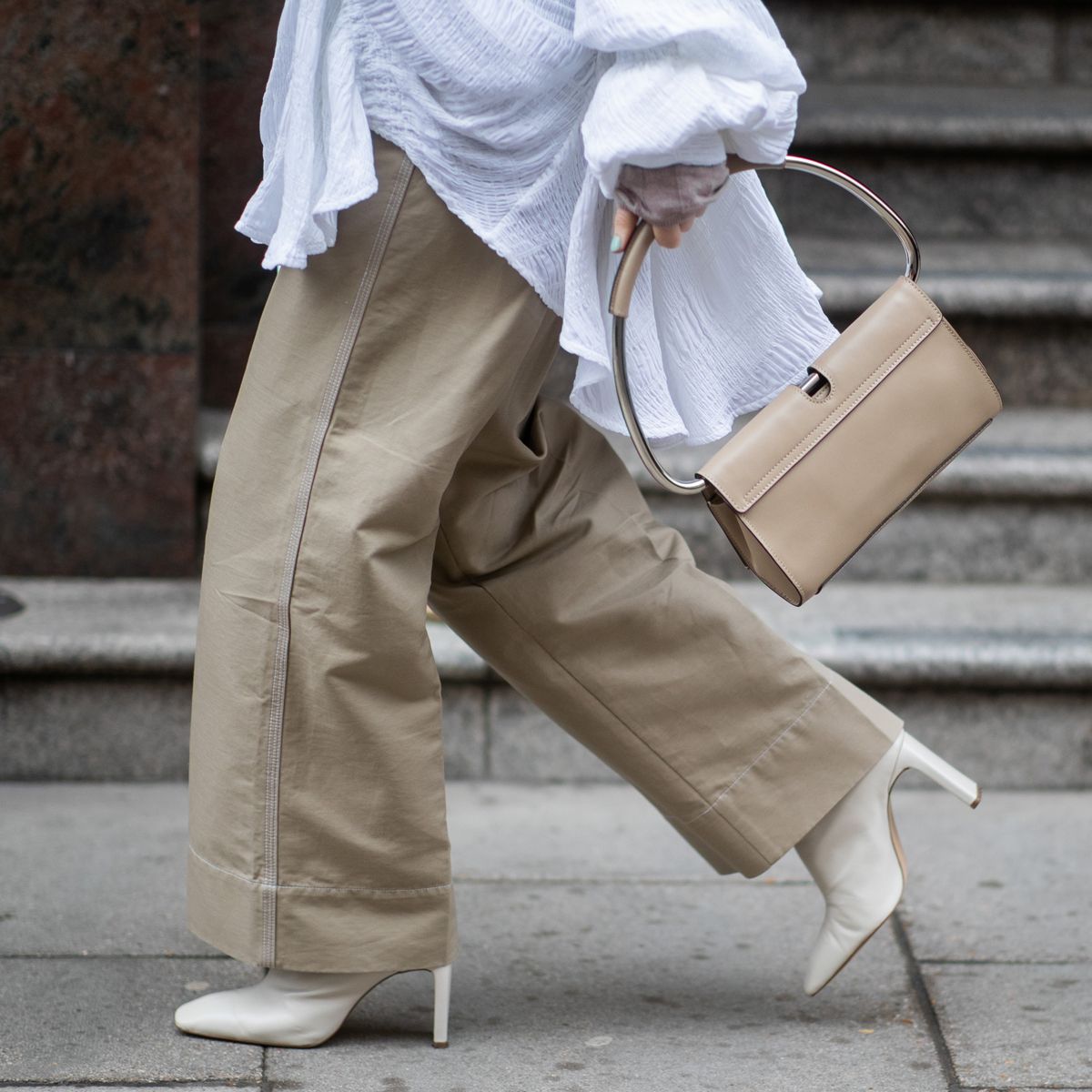 A London Street Fashion Female short red hair wearing beige knee