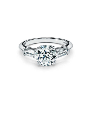 Tiffany + Three Stone Engagement Ring With Baugette Side Stones in Platinum