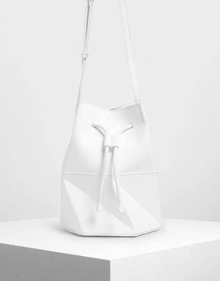Charles & Keith + Geometric Drawstring Bucket Bag
