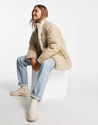ASOS Design + Faux Leather Patched Fleece Puffer Jacket in Stone