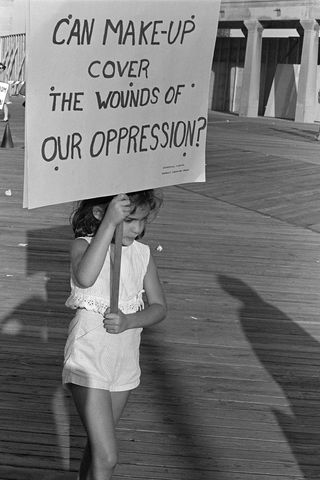 A young demonstrator protesting the Miss America beauty pageant, 1968