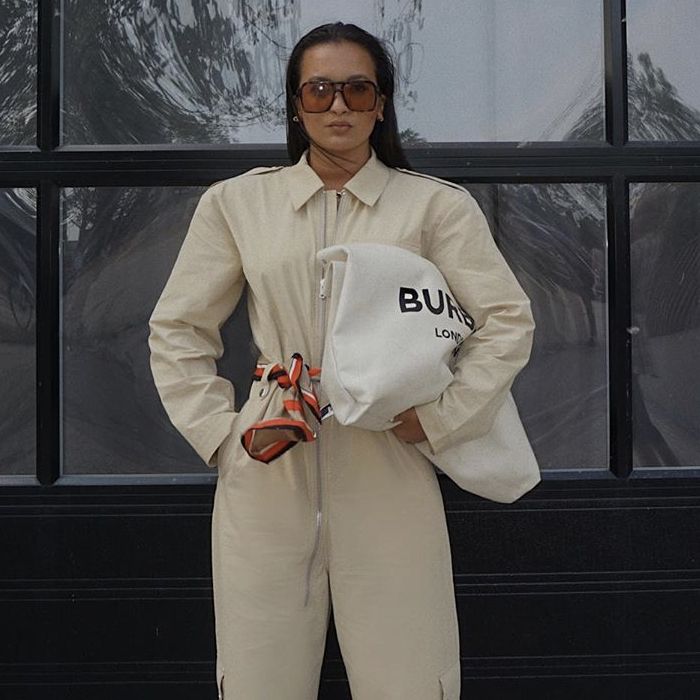 boiler suit tied around waist