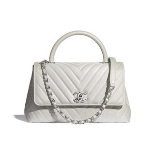 Chanel + Flap Bag With Top Handle