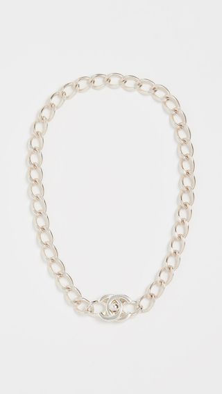 What Goes Around Comes Around + Chanel Silver Turn Lock Necklace