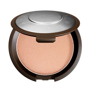 Becca + Shimmering Skin Perfector Pressed Highlighter in Champagne Pop