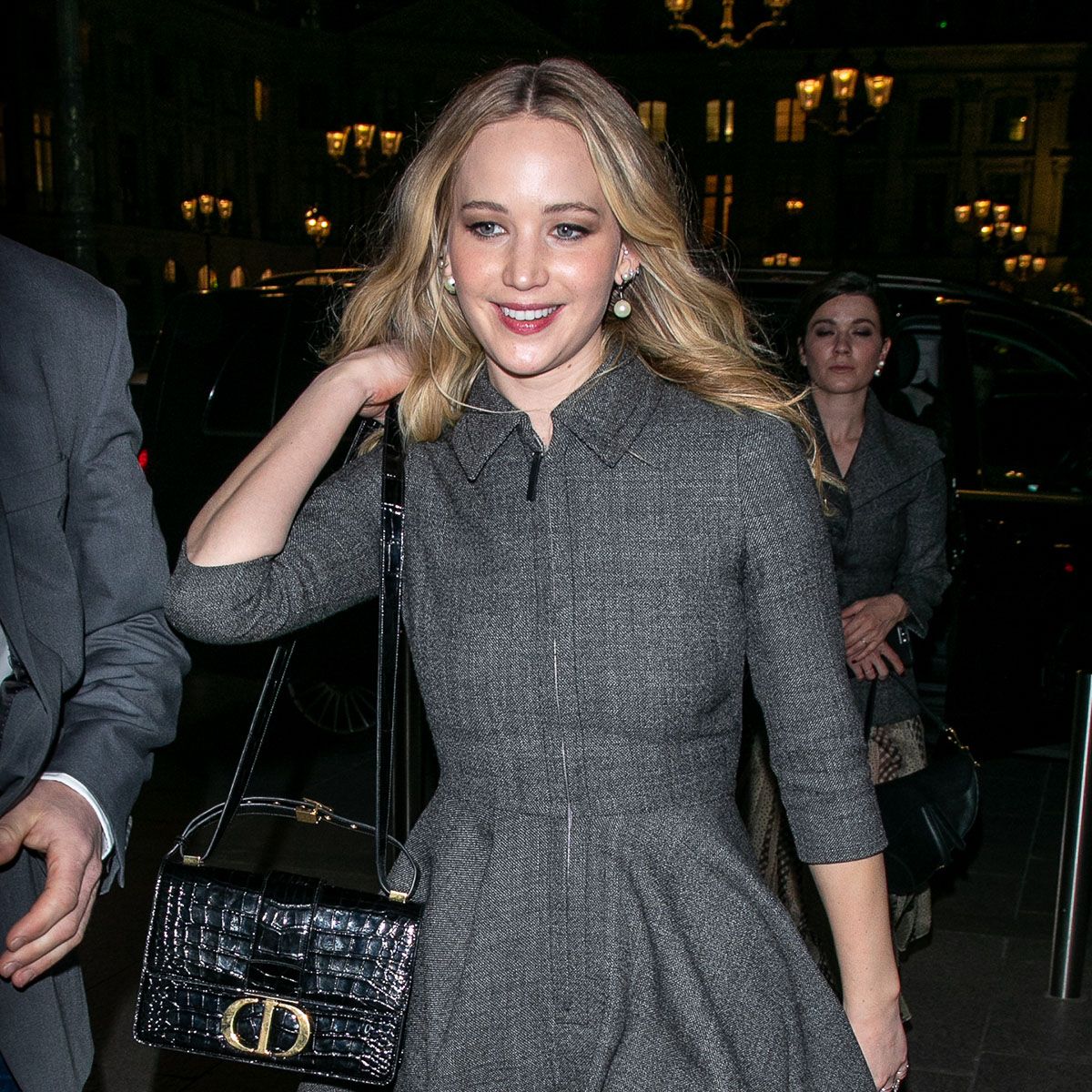 jennifer lawrence grey dress Jennifer Lawrence debuts her engagement ring at Paris Fashion Week
