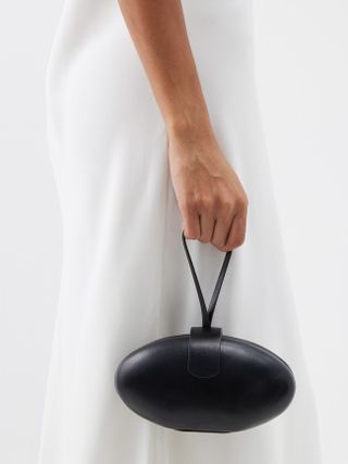 The Row + Lou Moulded Oval Leather Clutch