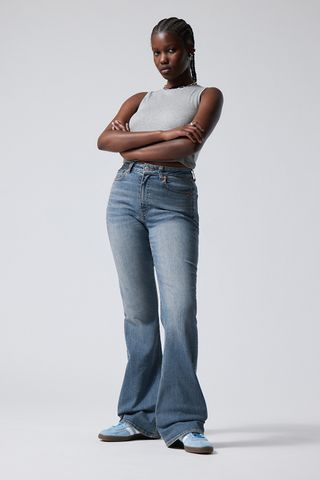 Weekday + Glow Curve High Flared Jeans in Treasure Blue