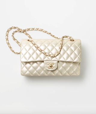 Chanel + Classic Handbag in Metallic Lambskin 
Gold-Tone Metal