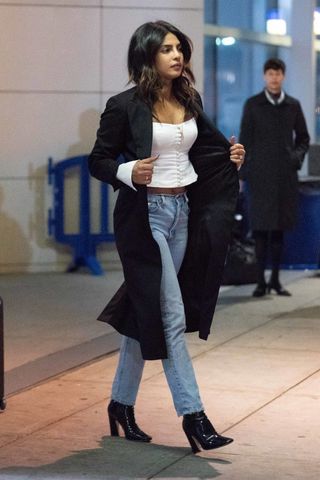 celebrity-airport-outfits-with-jeans-284999-1579852185541-main