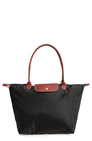 black nylon tote bag with tan straps