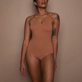 Nubian Skin + Cocoa by NS Bodysuit in Cafe au Lait