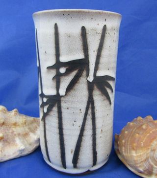 Vintage + Studio Pottery Vase. a White Column Vase With Wax Relief