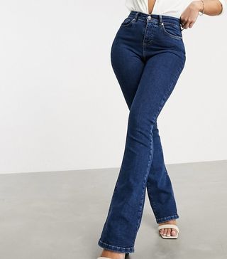 ASOS Design + Hourglass Lift and Contour Flare Jeans in Midwash