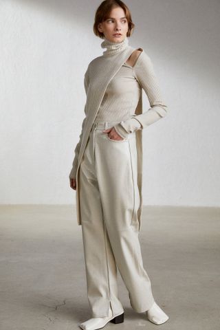 Source Unknown + One-Shoulder Sleeve Extra Fine Wool Knit in Ivory