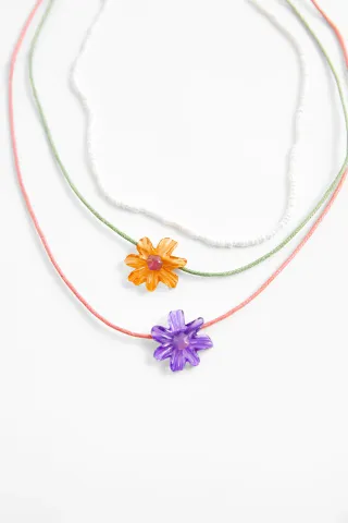 Zara + Pack of Resin Daisy Necklaces