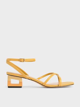 Charles & Keith + Sculptural Chrome Heel Sandals in Yellow