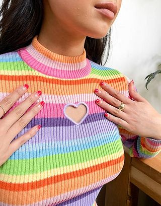 Minga London + Fitted Ribbed Long Sleeve Top in Rainbow Stripe With Heart Cut Out