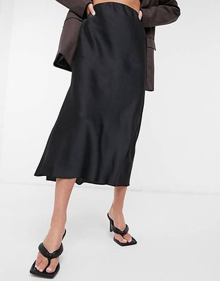ASOS + Satin Bias Slip Midi Skirt in Black